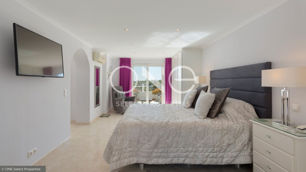 bedroom with his and hers dressing area in property for sale in algarve