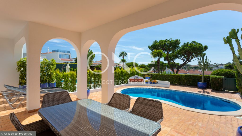 villa with pool and private terraces in lakeside village to buy